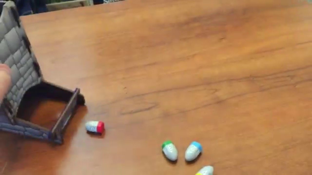 Tiny Epic Western Bullet-Shaped Dice in a Dice Tower