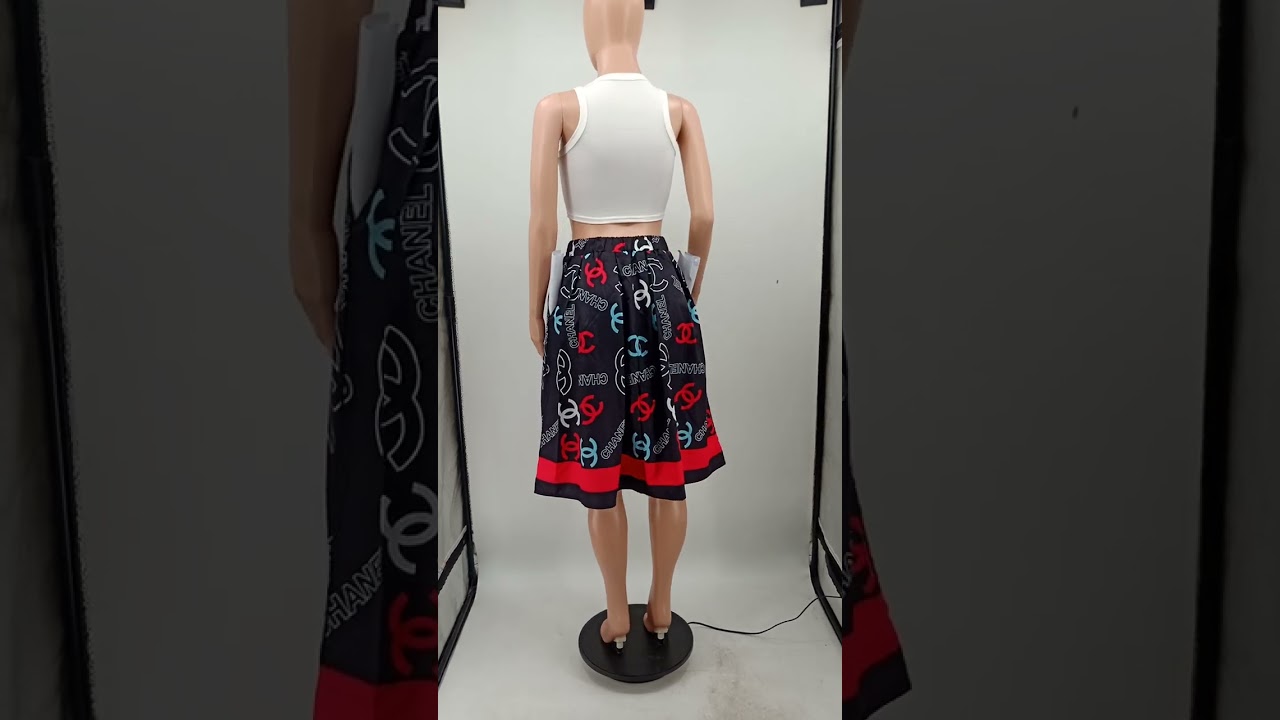 L410 Fashion High Quality Elastic Printed Pleated Swing Skirt with Belt