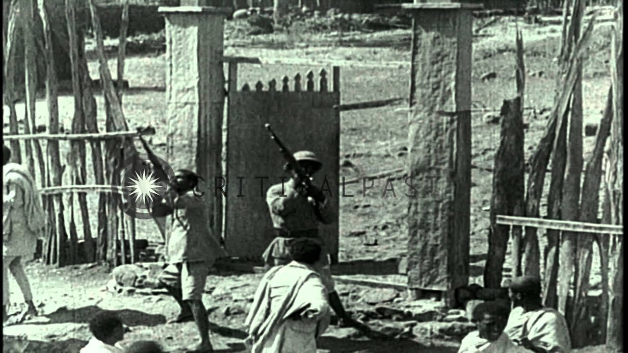 Italians bombard Dessey village as Ethiopians fire anti aircraft guns in Ethiopia...HD Stock Footage
