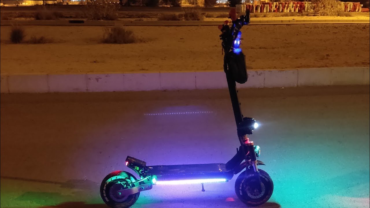 riding electric scooter at night