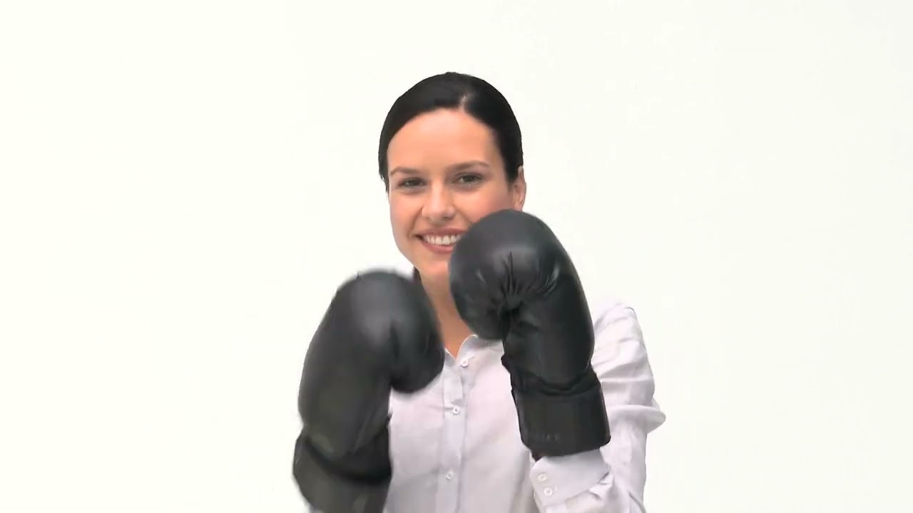 Beautiful Woman Boxing over White Background Video Template | WaveBreak Media