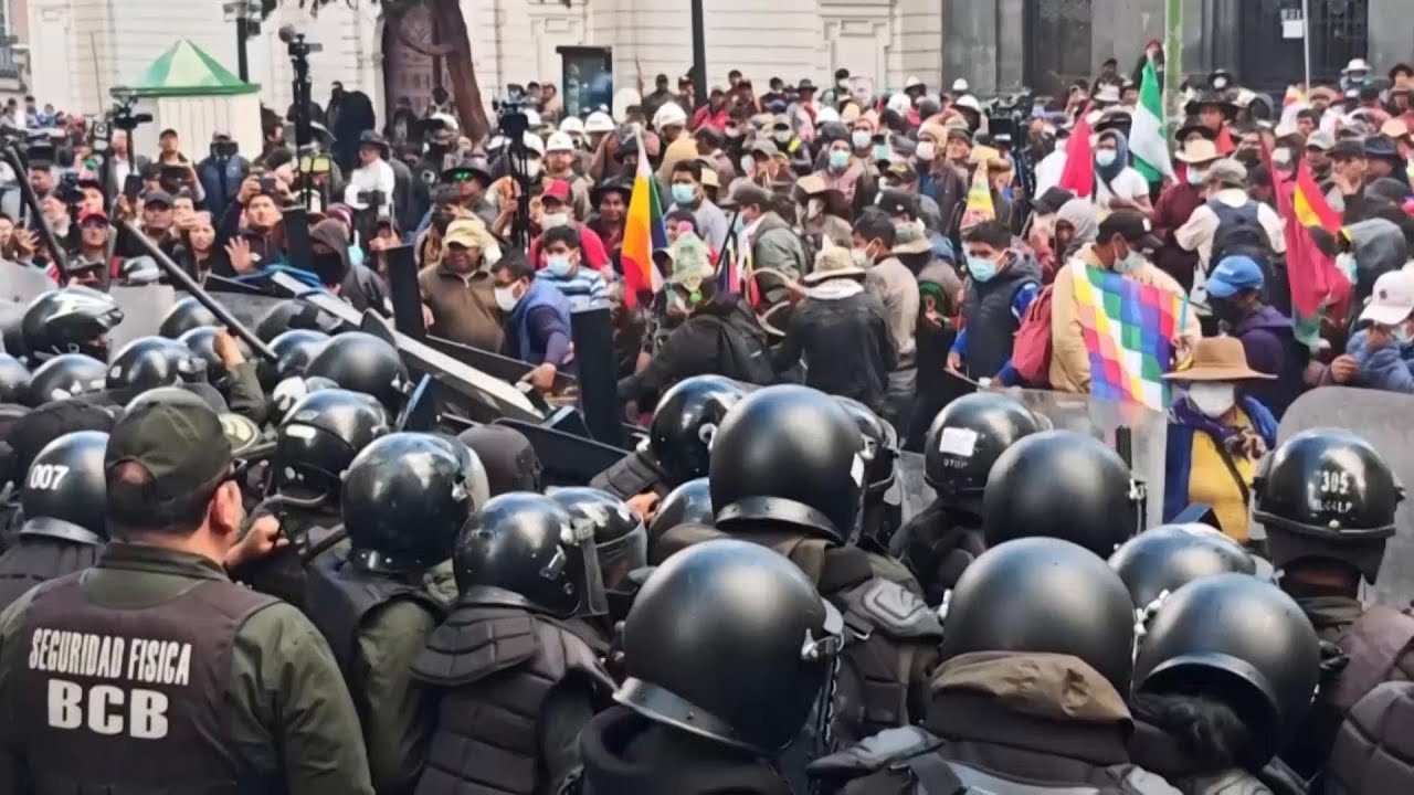 Supporters of former Bolivian president Evo Morales clash with police
