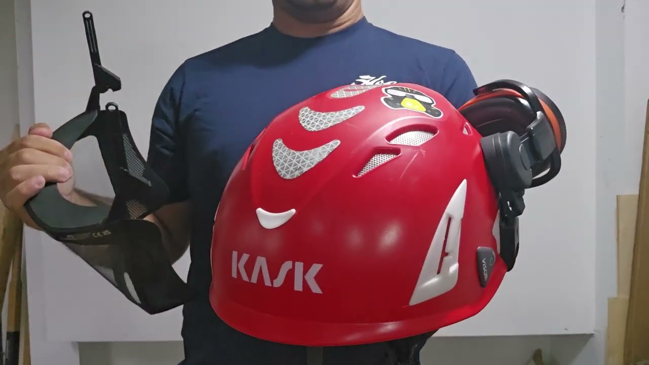 Kask Super Plasma with face visor and hearing protection. 