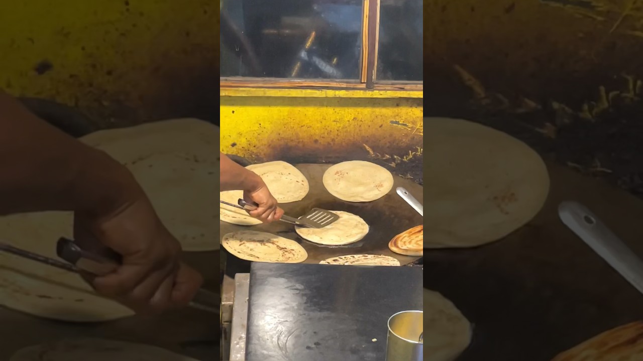 Laccha Paratha Egg Roll😱 #shorts #viral #youtubeshorts #viralfeeds #shortvideo #eggroll #streetfood