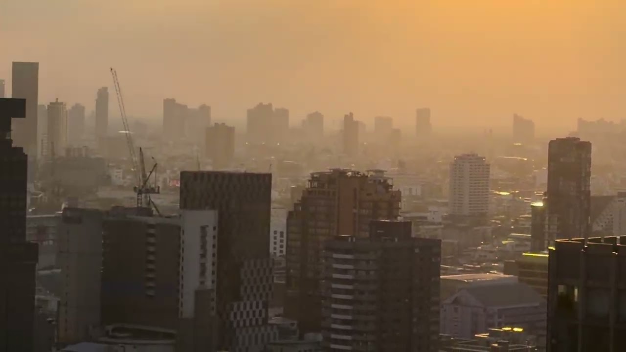 Bangkok - Smoggy sunset from Wish Signature Midtown Siam