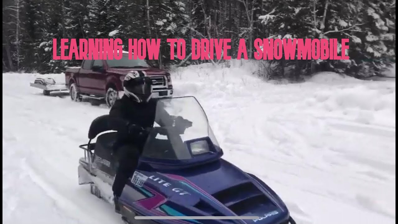 LEARNING HOW TO DRIVE A SNOWMOBILE