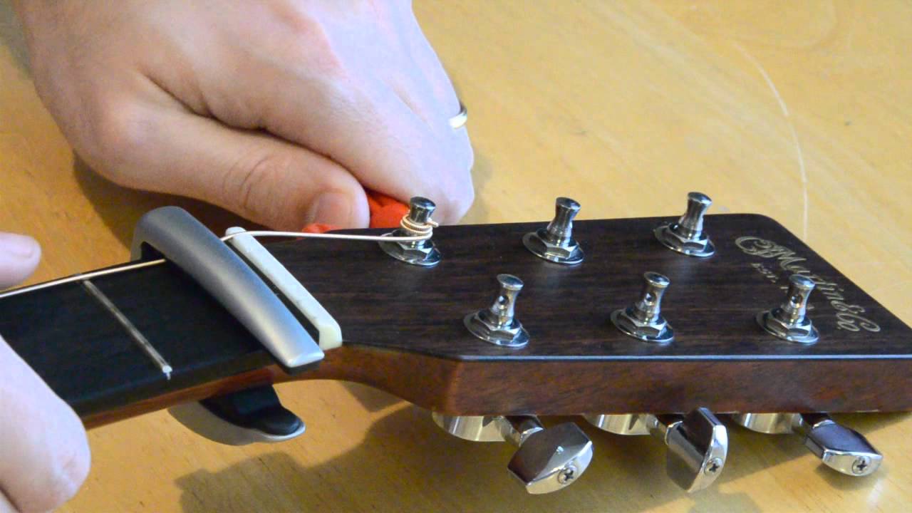 How To Change Strings On An Acoustic Guitar