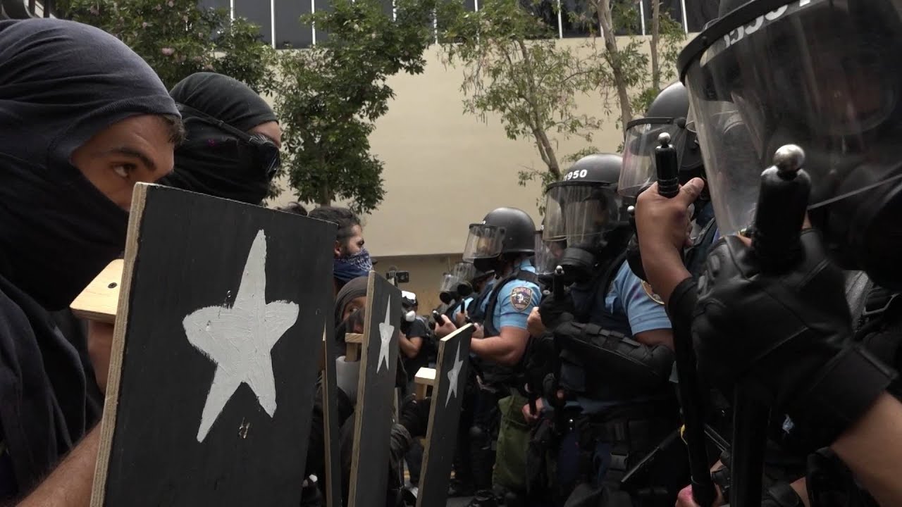 May Day in Puerto Rico: Police Attack Anti-Austerity Protesters with Pepper Spray & Tear Gas