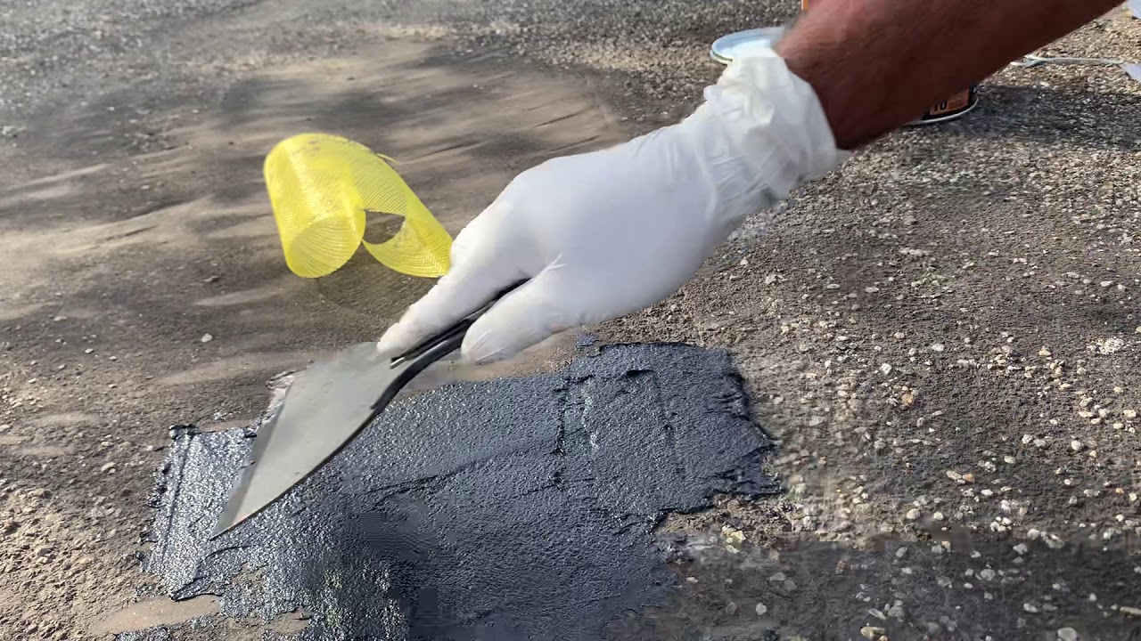 Patching a hole in tar and gravel roof
