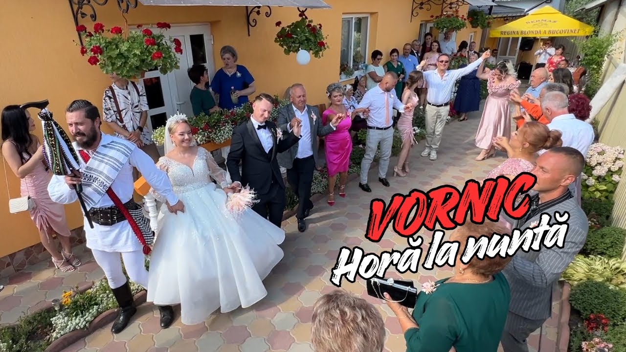 Horă la nuntă. Strigături și voie bună.