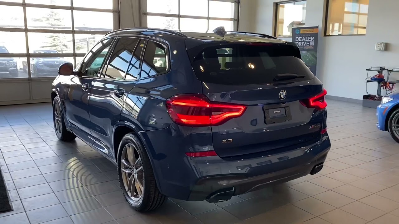 2021 BMW X3 M40i phytonic blue with Fiona Red/Black interior