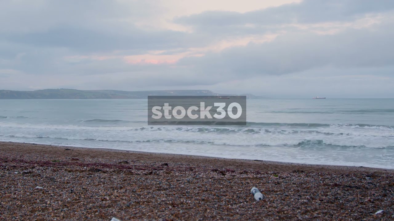 Looking Out To Sea At Greenhill Beach, Weymouth Bay, Dorset, UK