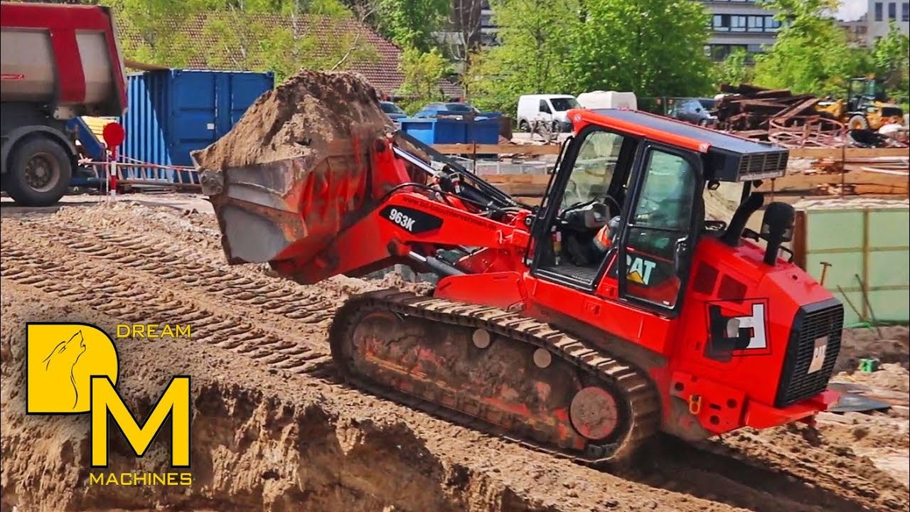 CATERPILLAR DOZER 963K LADERAUPE + BAGGER BAUSTELLE AM BAHNÜBERGANG DREAM MACHINES