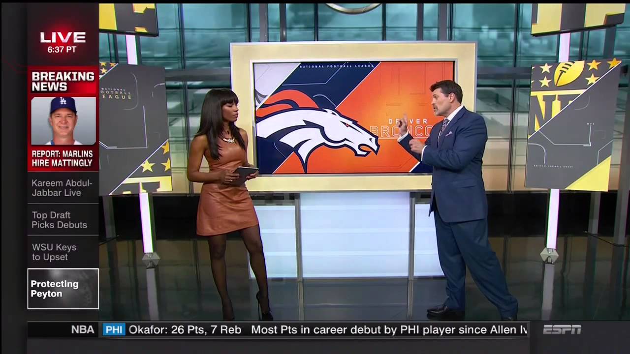 Cari Champion in Dark Stockings and Brown Leather Dress ESPN