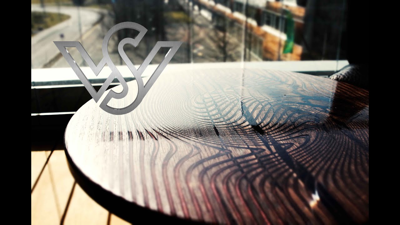 spiral coffee table made of bog oak and epoxy resin- river table