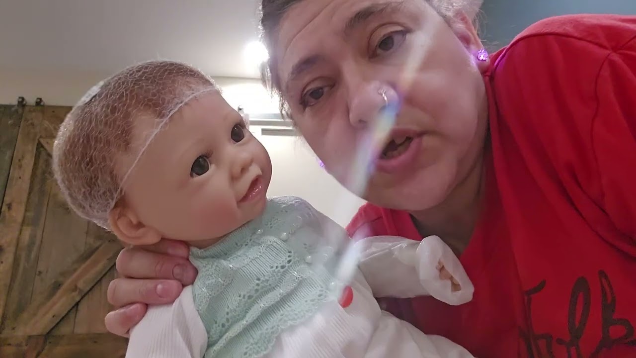 My new robotic ashton drake baby doll that moves its legs.