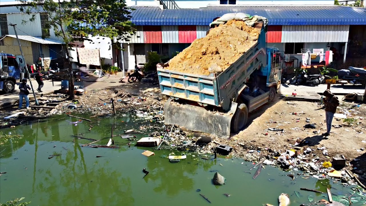 Amazing Start New Project!! Dump Truck Unloading Soil with Komat'su D20P Dozer