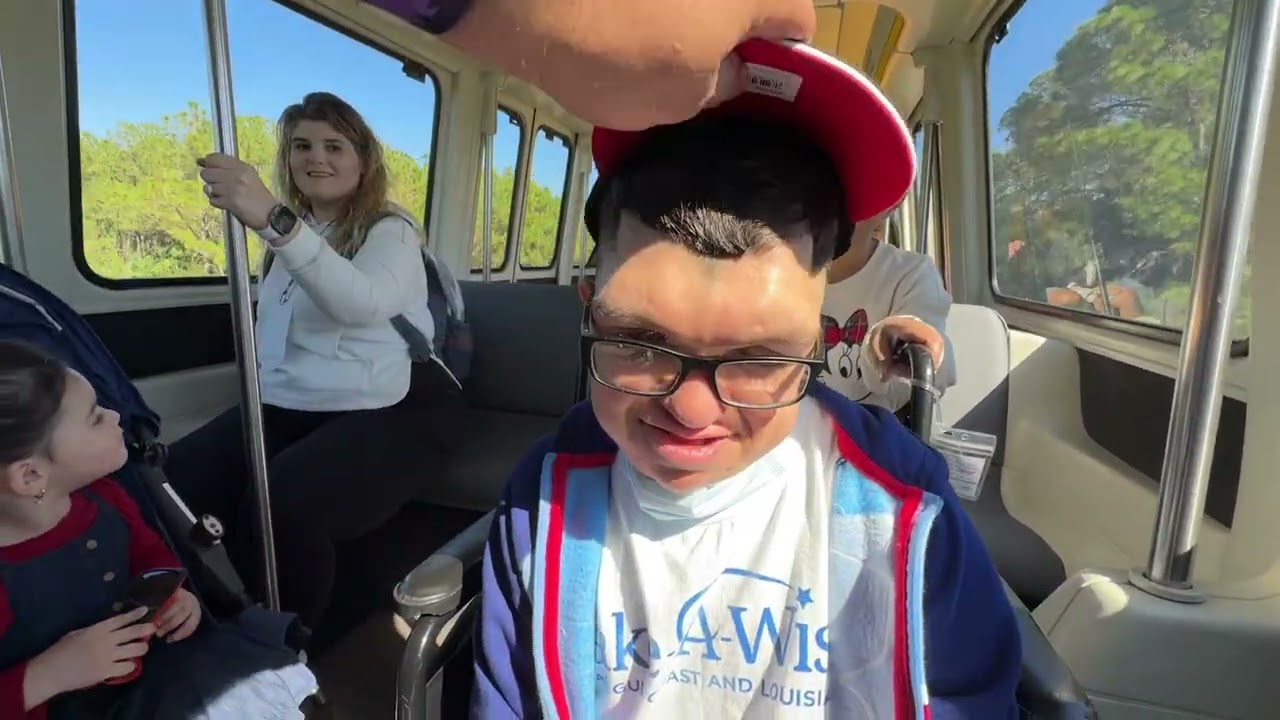 Jesse riding the mono rail train at Disney 2025 Magic Kingdom
