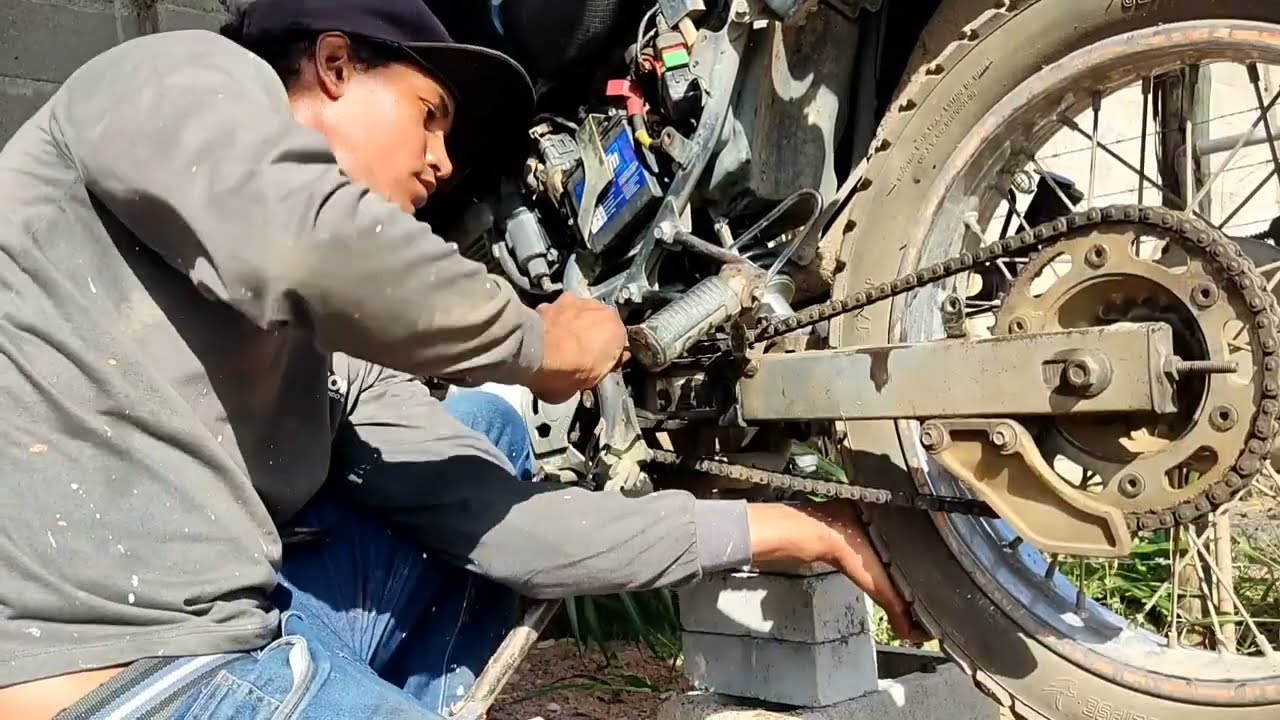 como trocar amortecedor central de Bros