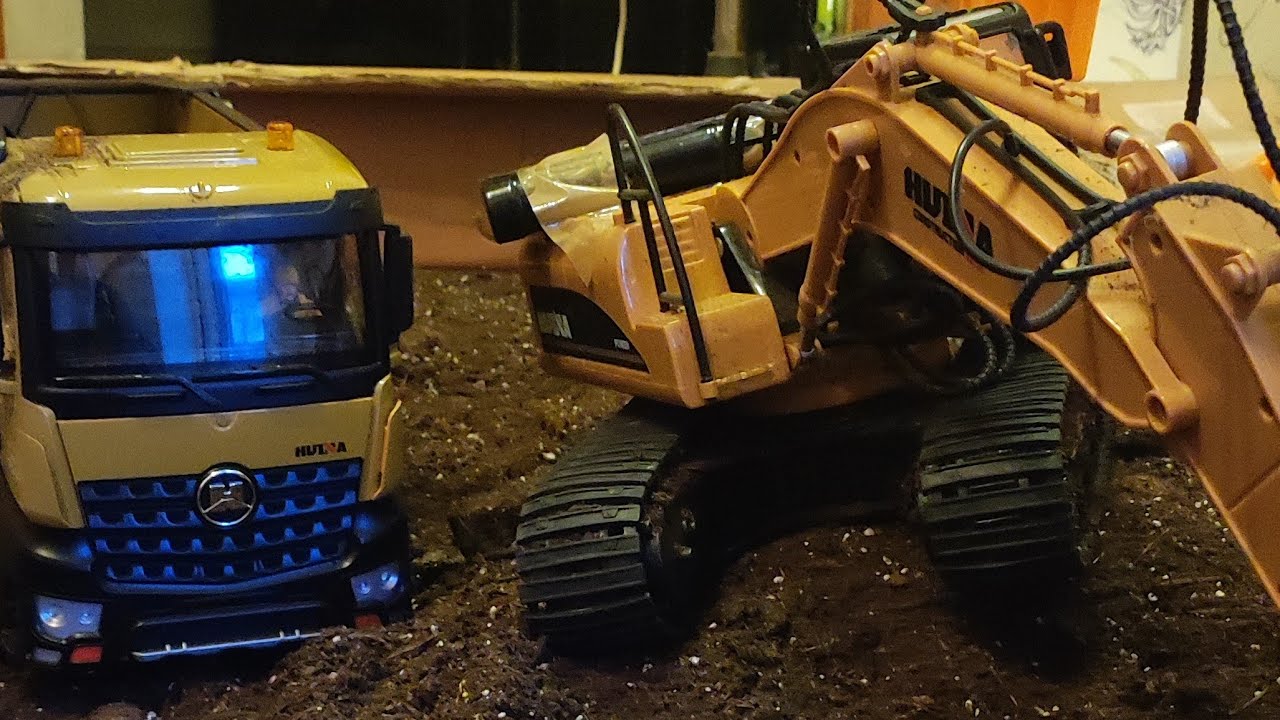 RC dirt mayhem: excavator vs dump truck