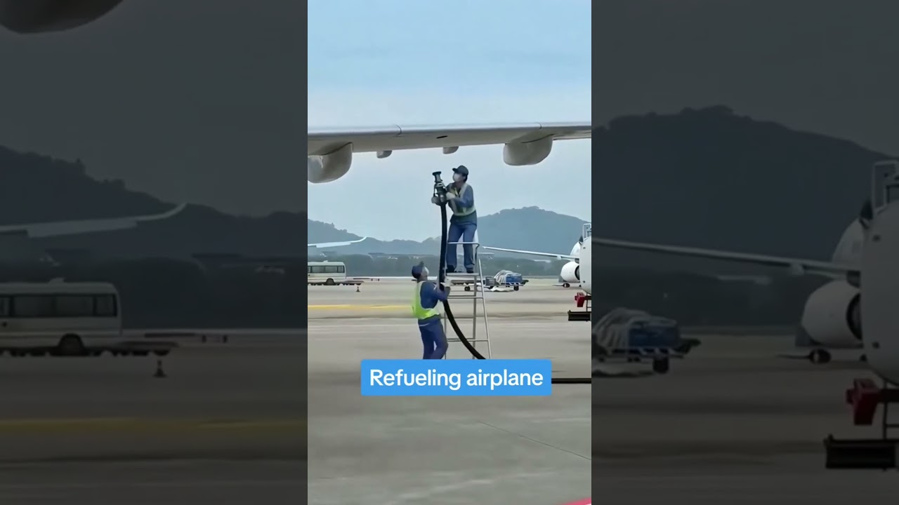Refuelling aeroplane #refueling #aeroplane #airplane #airport #wing #petrol #airportstaff