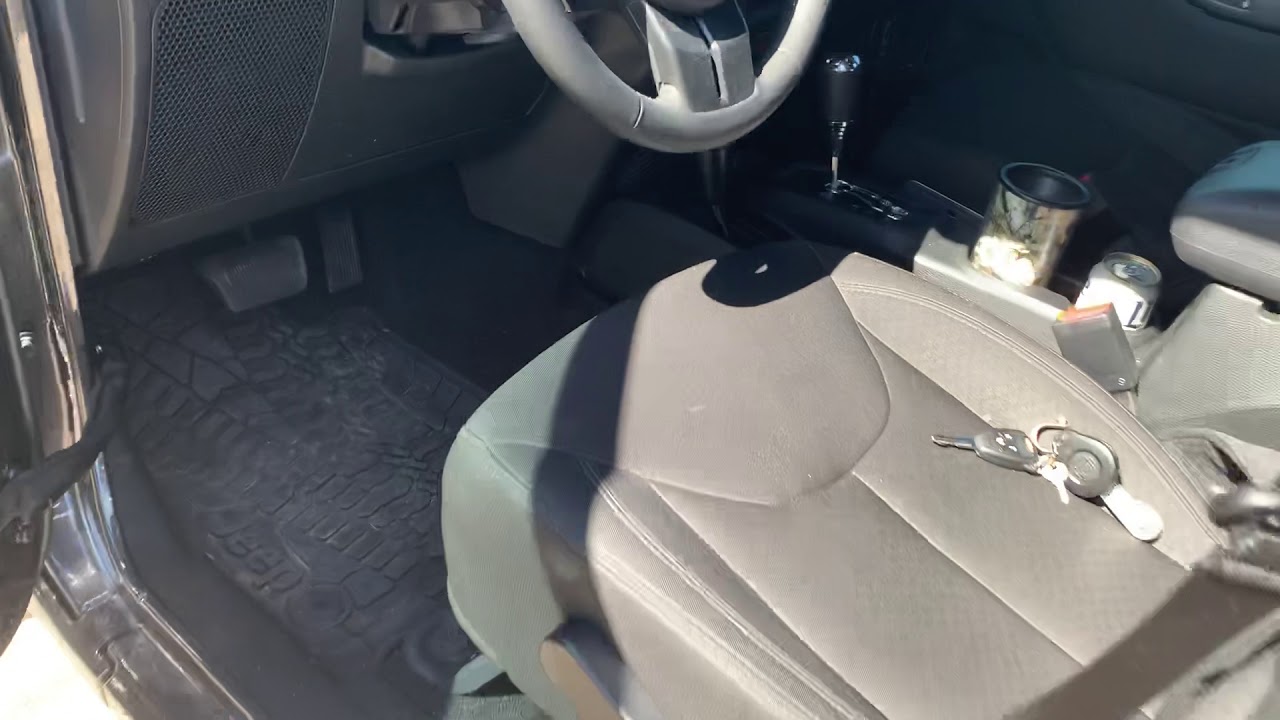 Lockdown pistol mount in a Jeep Wrangler