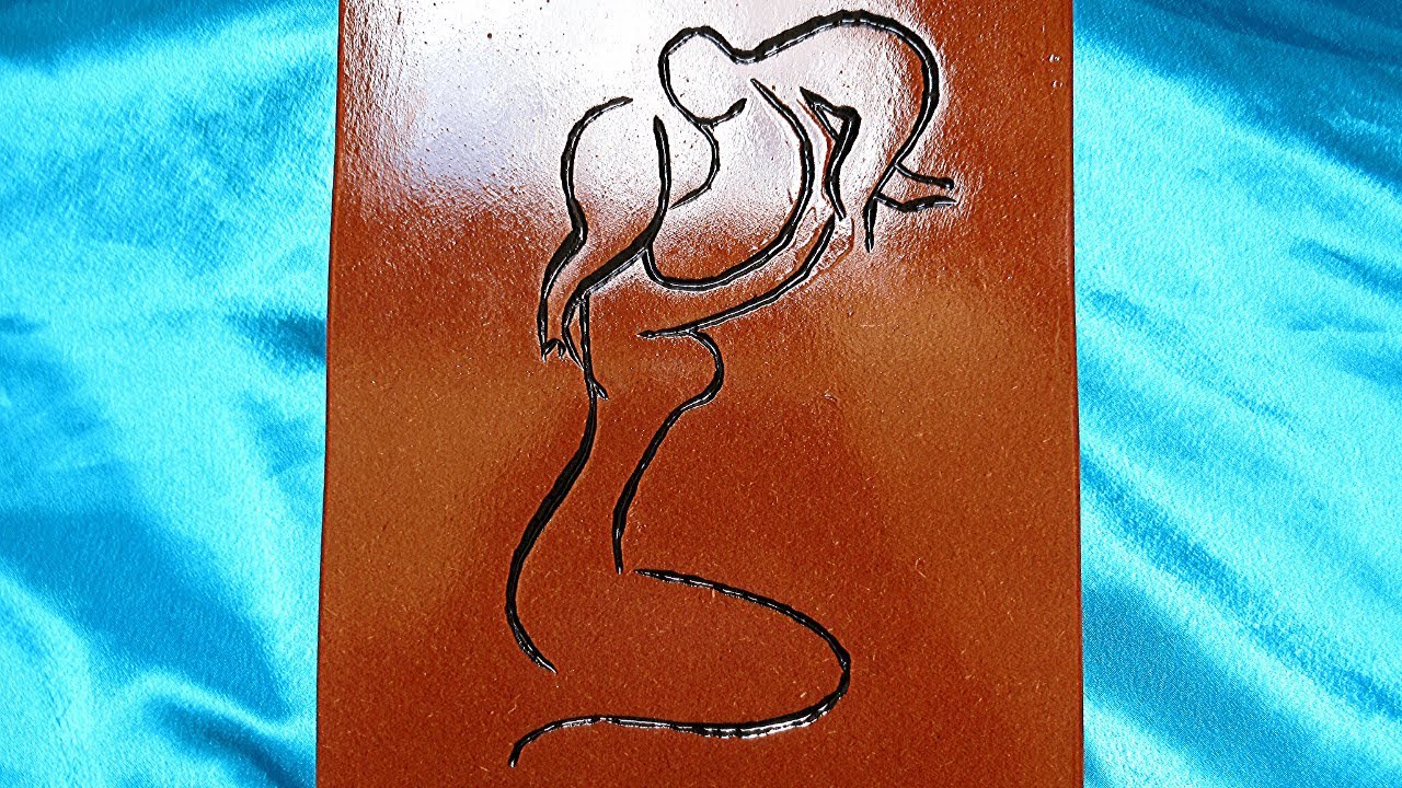 Wood carving | Carving a mother and child relief on MDF using a dremel rotary tool