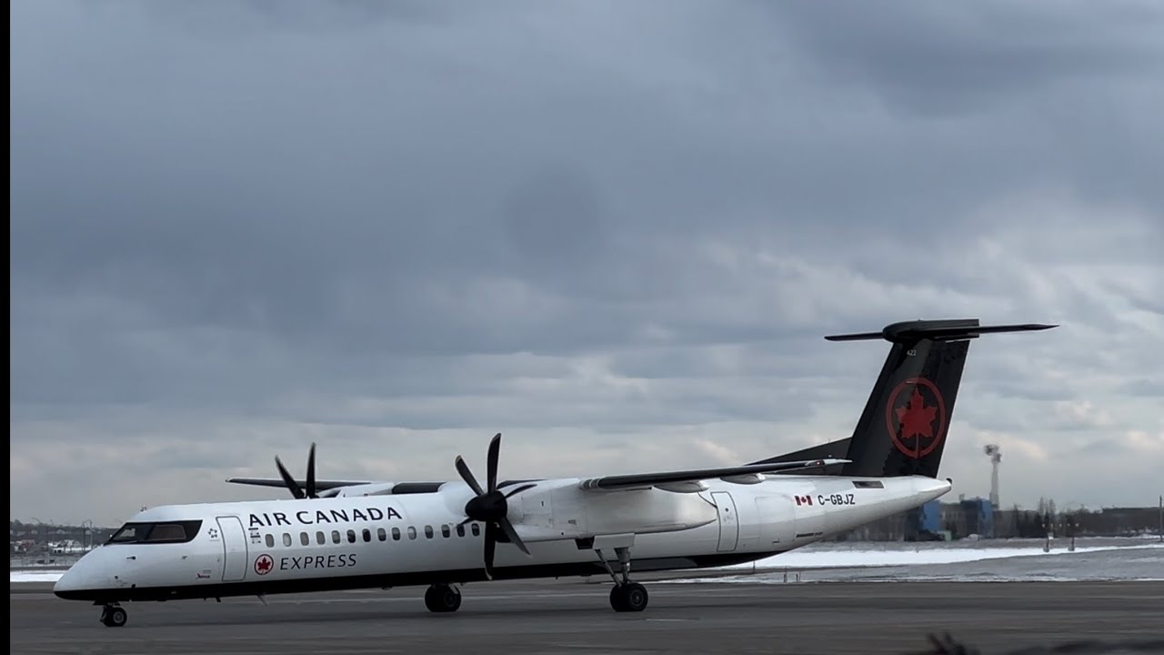 Air Canada ￼ Express Dash 8 Q400 ￼ Landing CYQU ￼ From CYYC and ￼ WestJet ￼ Encore Dash 8 Q400