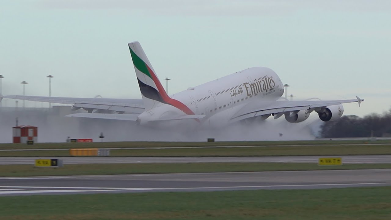 Emirates A380 departs on 05L on a damp runway with lots of spray