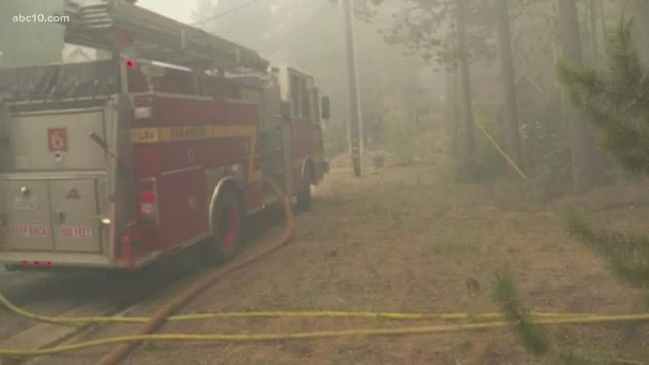 Fire crews protecting homes on edge of the forest in Meyers | Caldor Fire