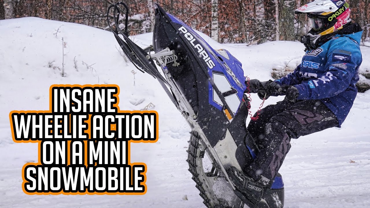 INSANE WHEELIE ACTION ON A MINI SNOWMOBILE
