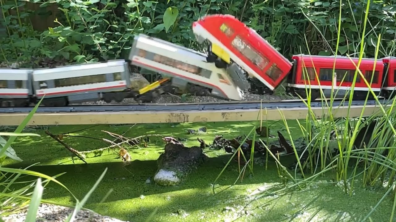 LEGO TRAIN VS LEGO TRAIN CRASH OVER POND!!