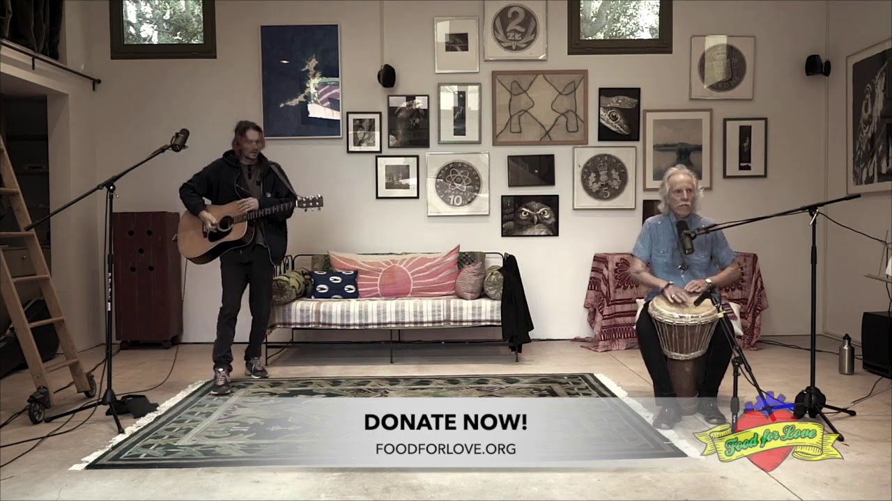 John Densmore and Micah Nelson performing 