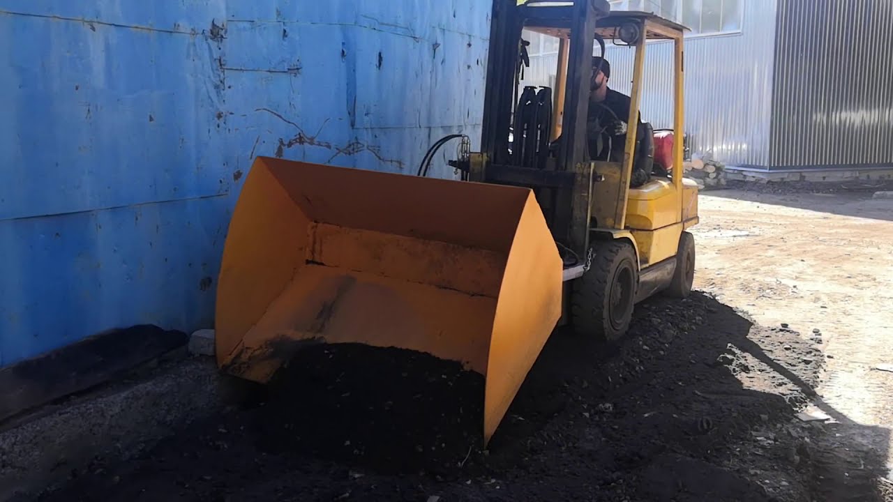 Работа  с фронтальным ковшом на вилочном погрузчике.