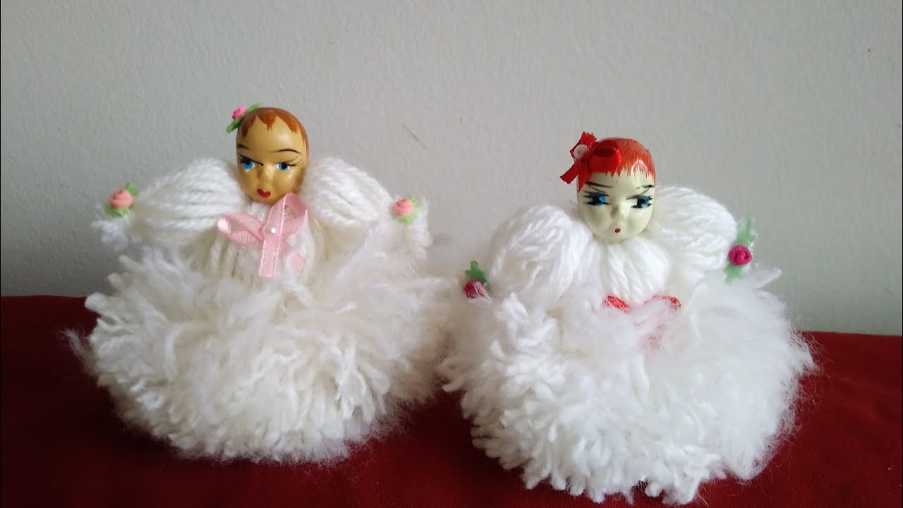Mini Boneca feita de lã