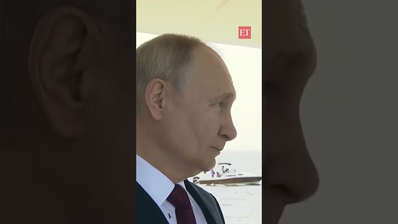 Watch: Vladimir Putin 'silences' a talkative host during Russia's National Anthem