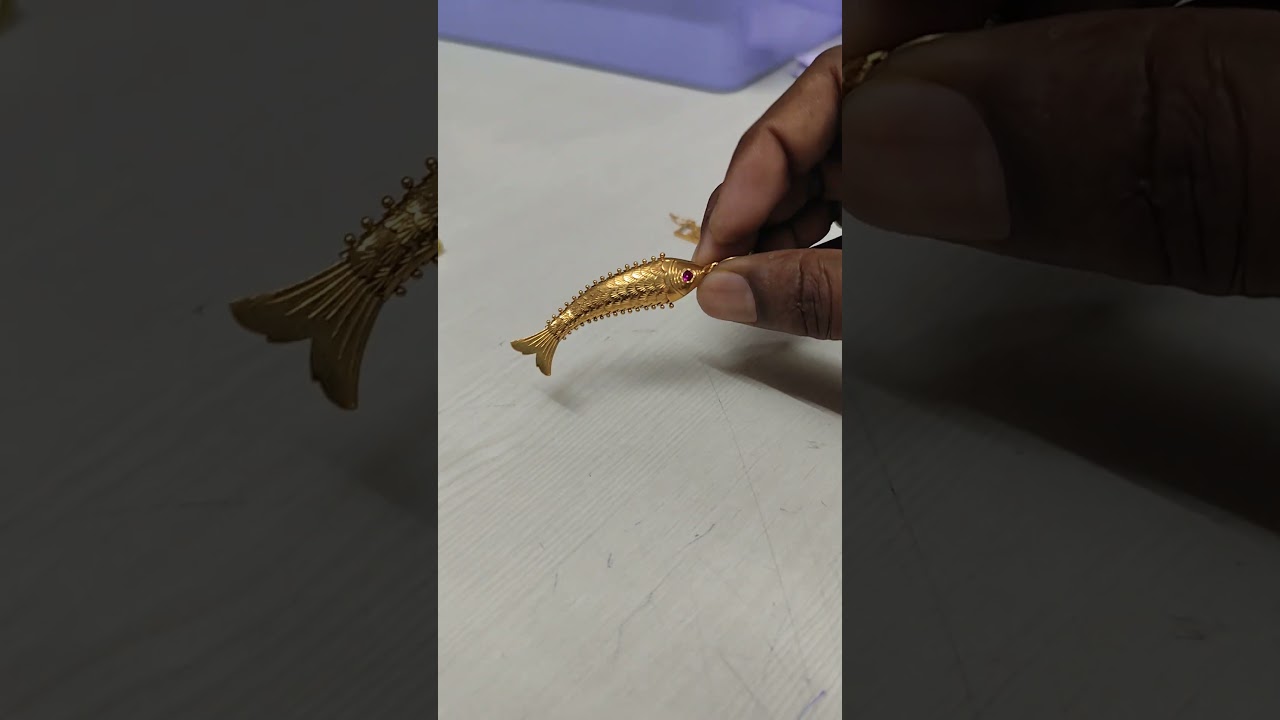 fish locket with gold
