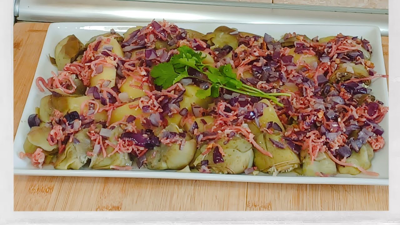 Alcachofas con Patatas Salteadas de Jamón y Cebolla