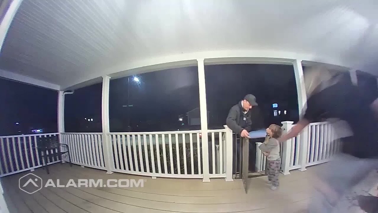 2-year-old boy hugs pizza delivery guy