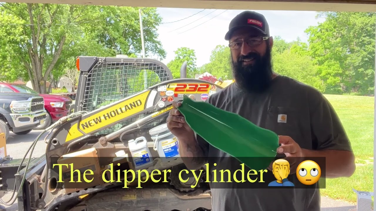 New Holland C232 track loader, air filter, fuel filter, and water separator maintenance