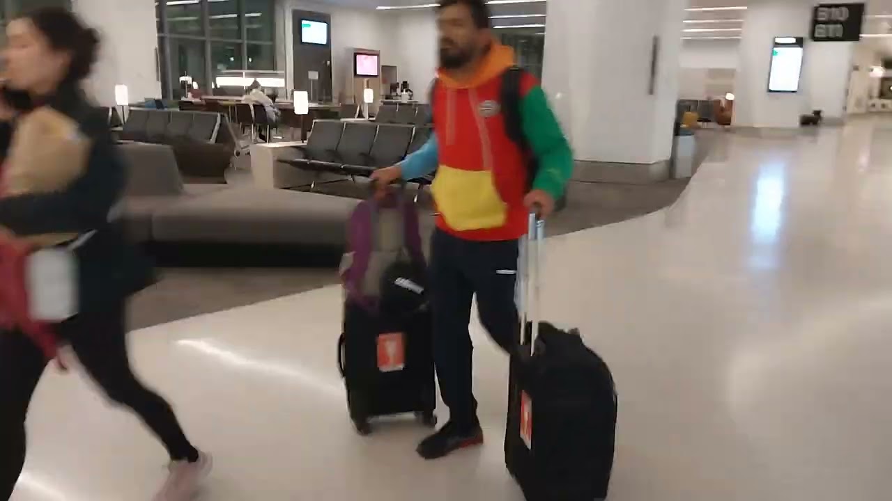 getting out the plane and walking to  baggage claim San Francisco International Airport