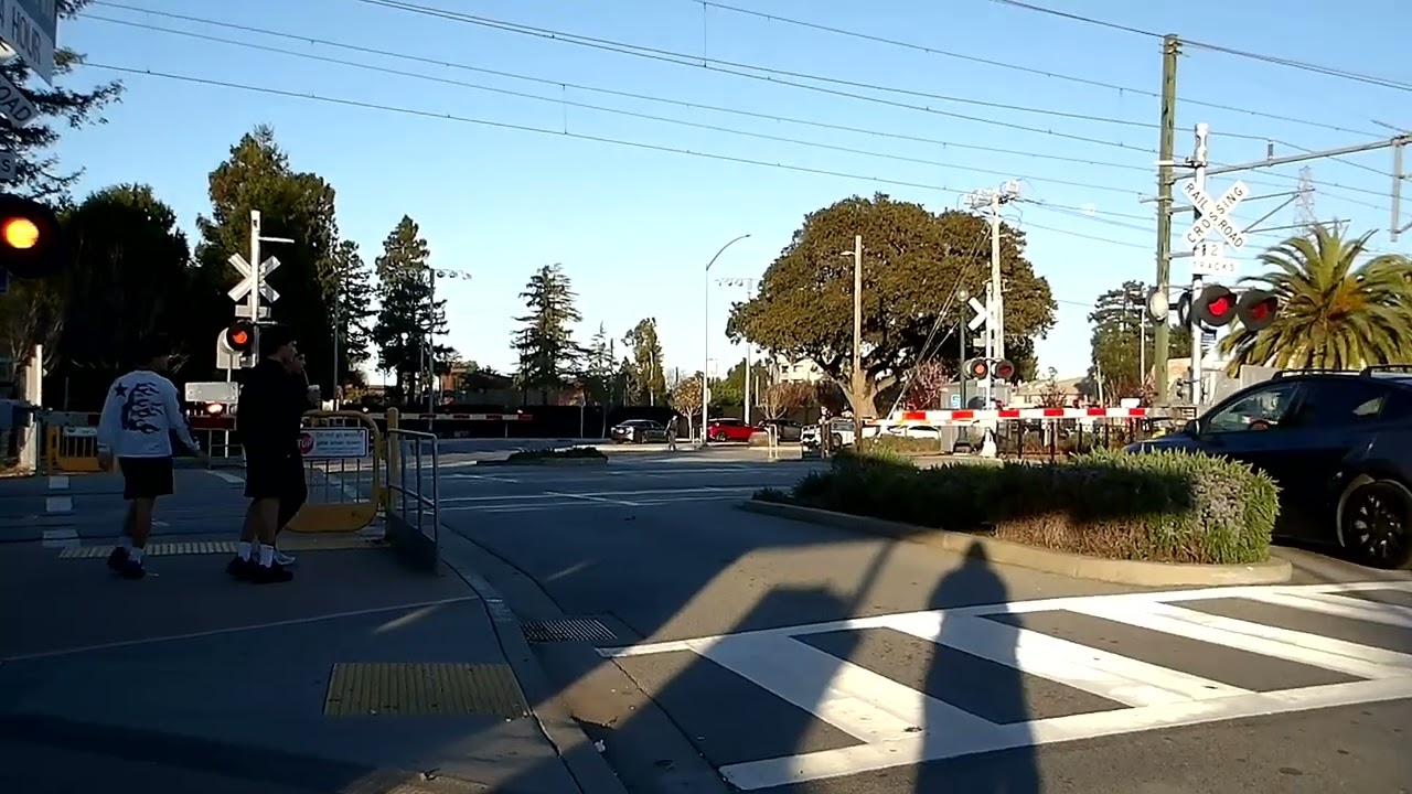 North Ln Railroad Crossing Caltrain Trains Meet Together Burlingame CA North and South
