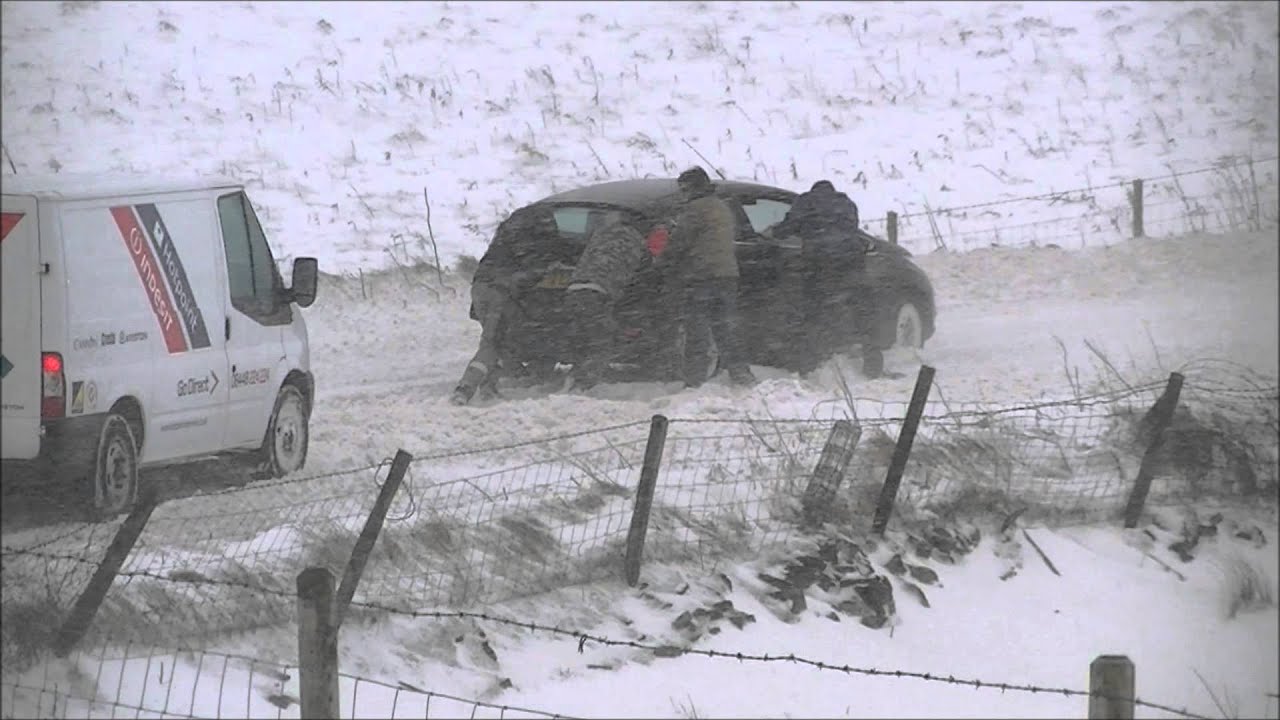 Car Gets Stuck In Drifting Snow