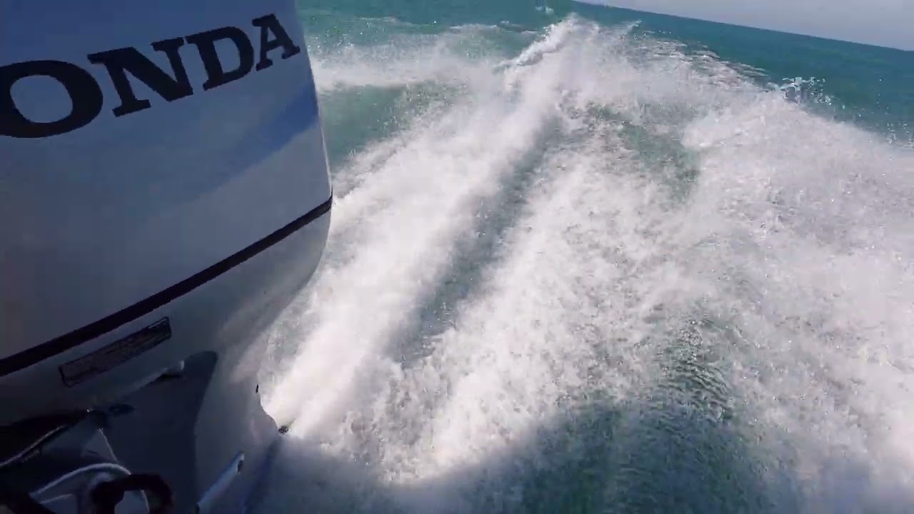 Running my 2021 Honda BF100 Outboard wide open with view from transom on my 2001 Lund Mr Pike 16.