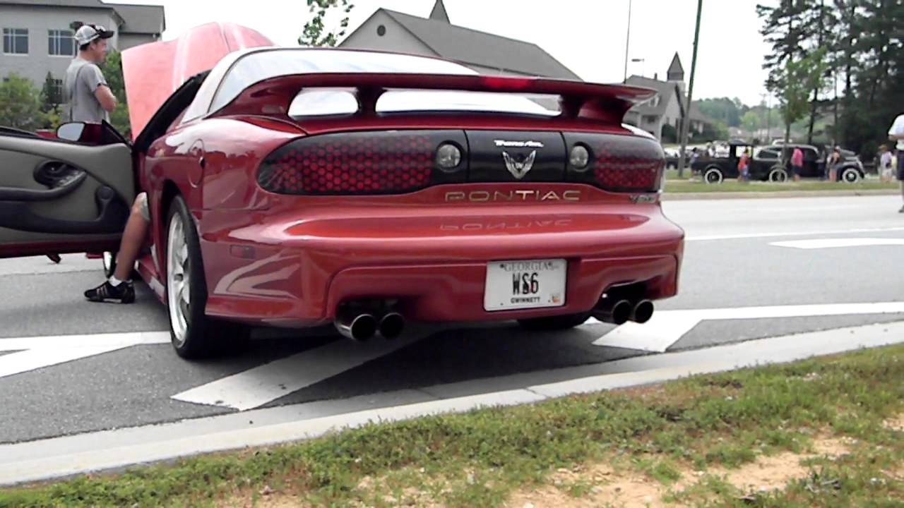 2001 Sunset Orange Pontiac Trans Am WS6 idling and few revs with cut-outs.