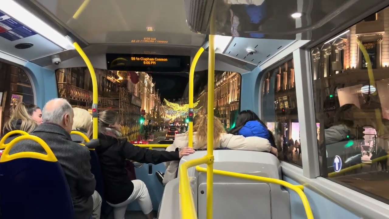 Riding an Iconic London Double Decker Red Bus Down Regent Street during the Holidays