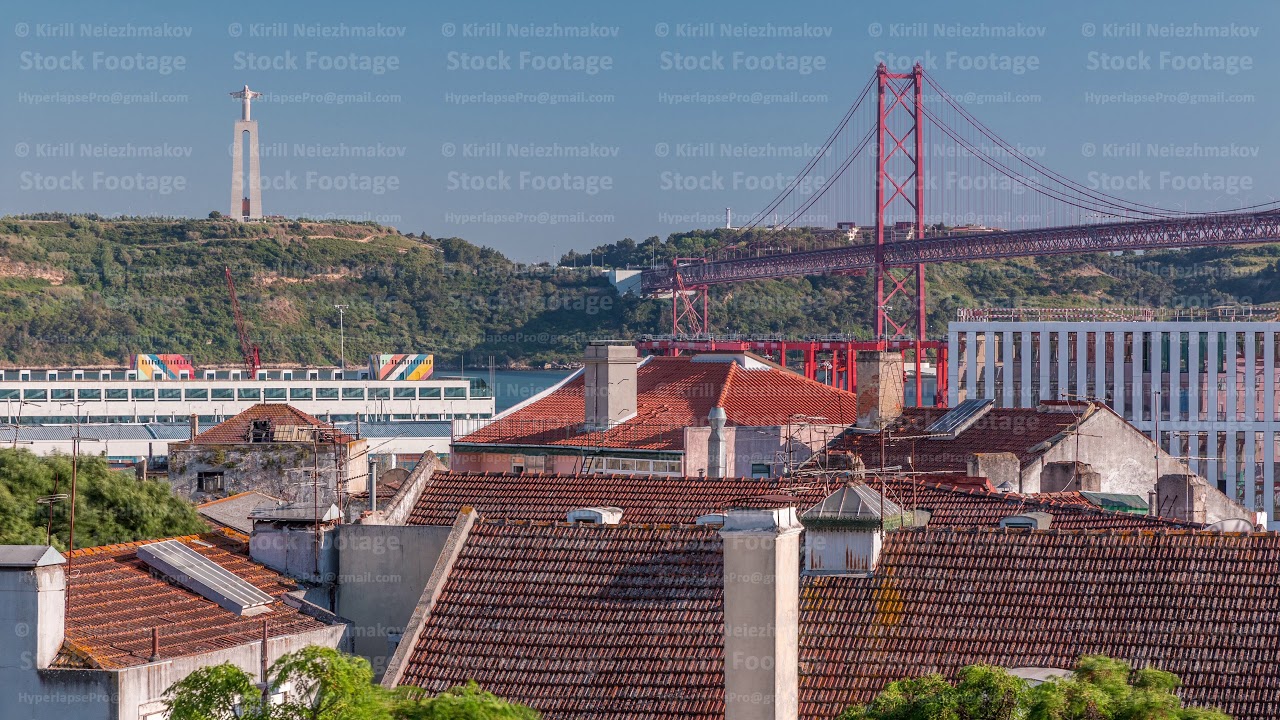 Aerial View Of Downtown Lisbon Skyline Of The Old Historical City timelapse And 25 de Abril Bridge