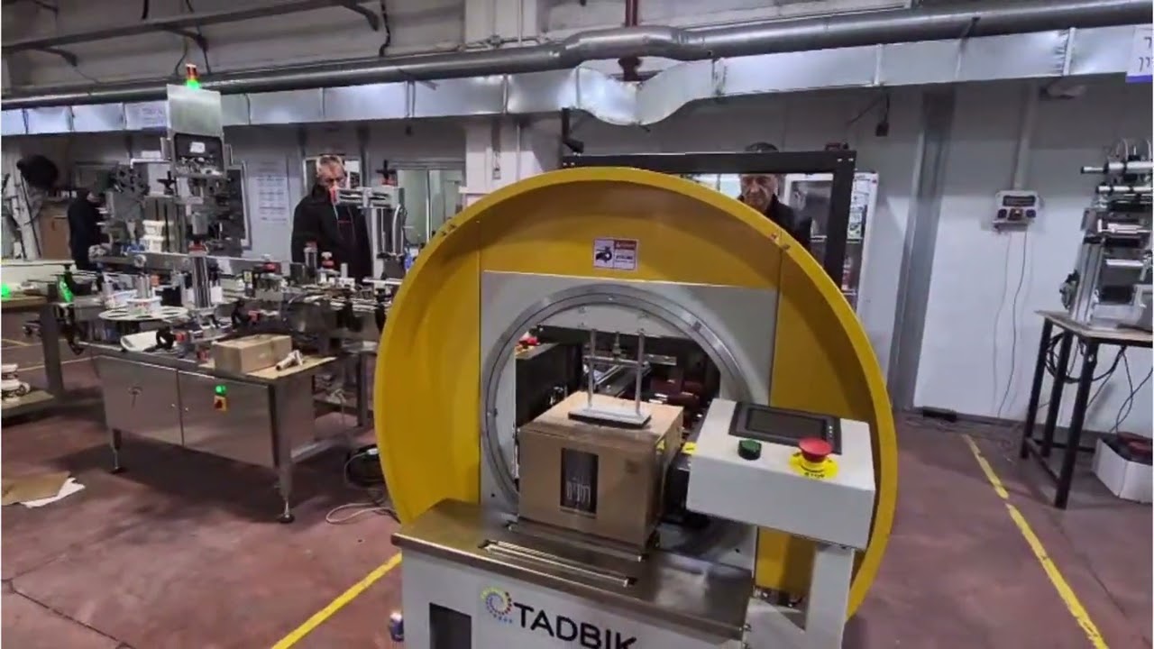 Wrap-around orbital case sealer integrated with & bottom sealer by TADBIK