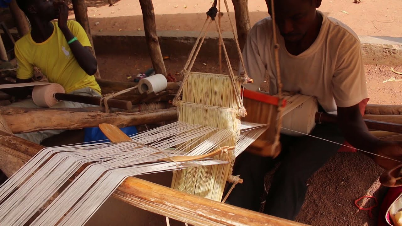 Handweaving African attire in Warinene,  Korhogo, Ivory Coast