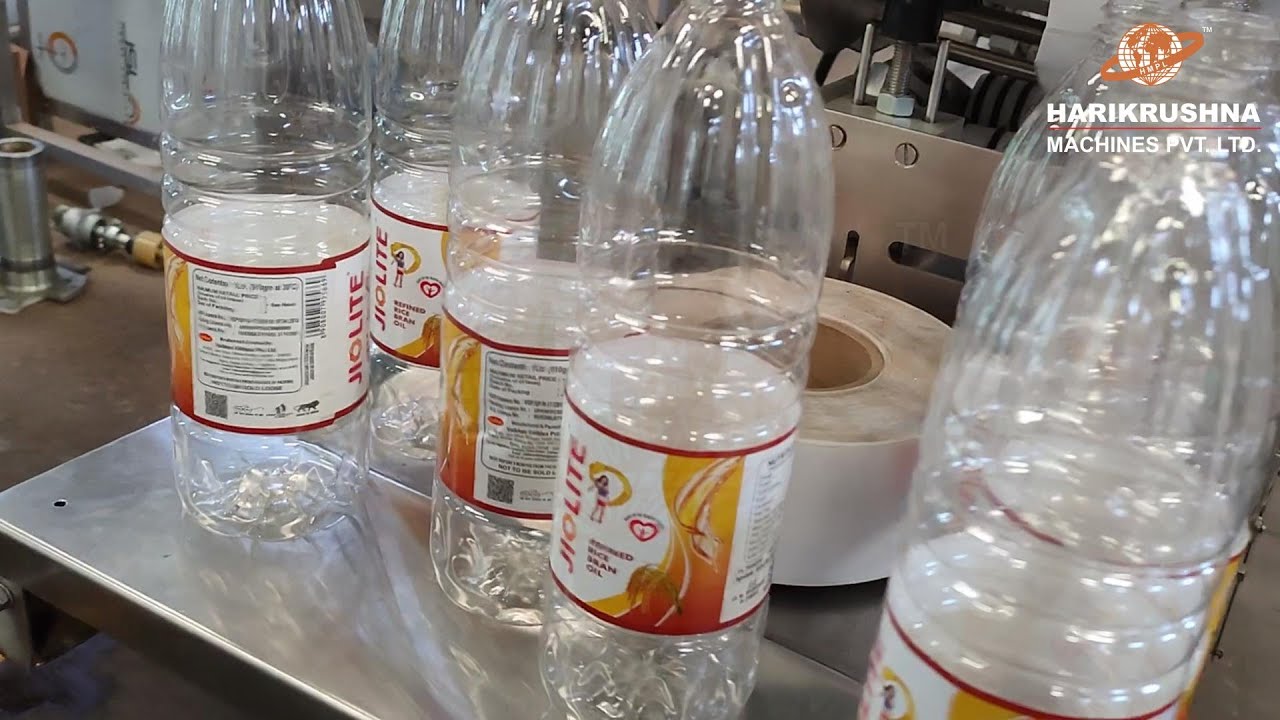 Edible Oil Round Bottle Sticker Labelling Machine with Pneumatic Wrapping for Round PET Bottles